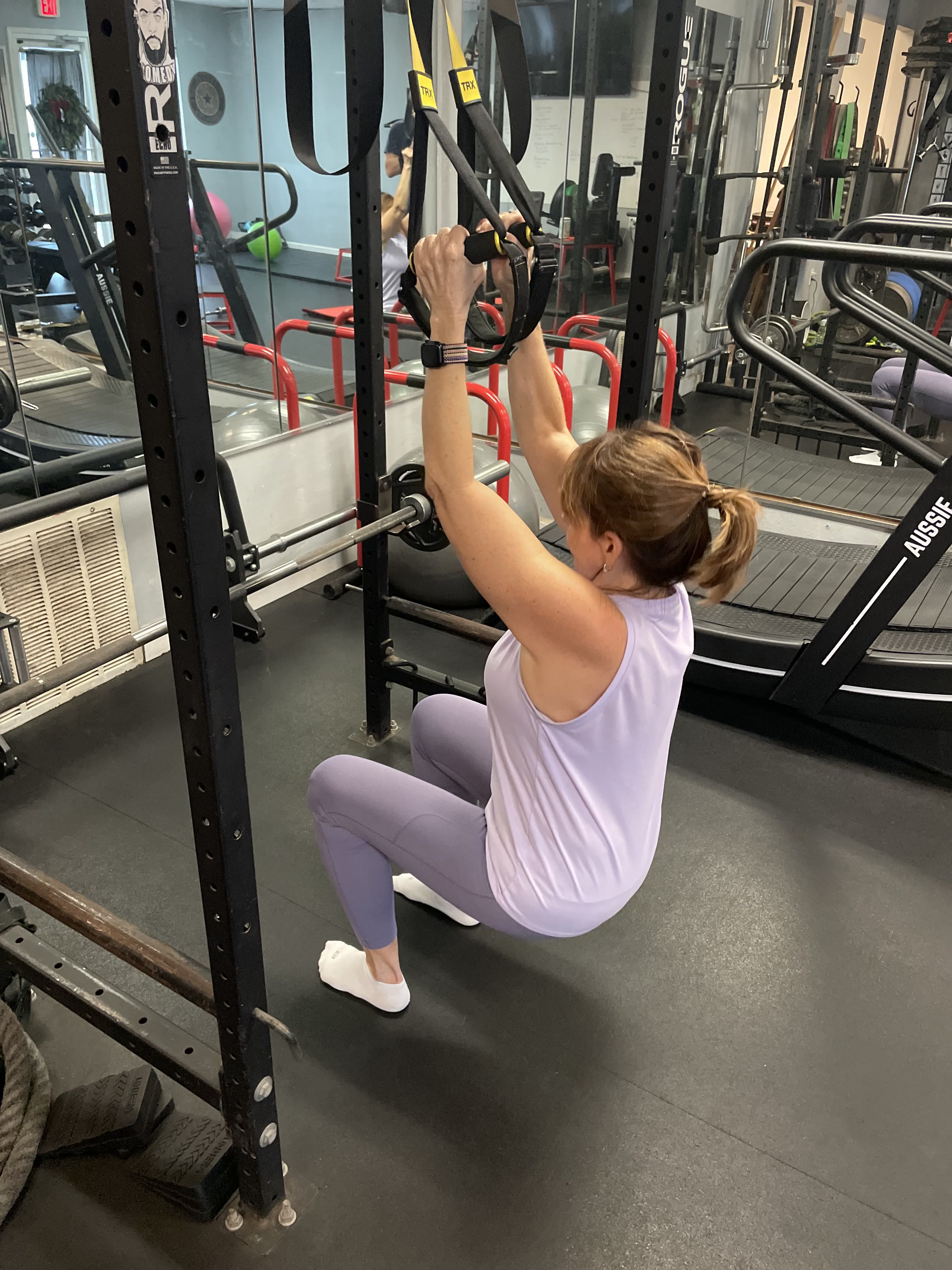 Client training on the PowerHouseATX gym floor