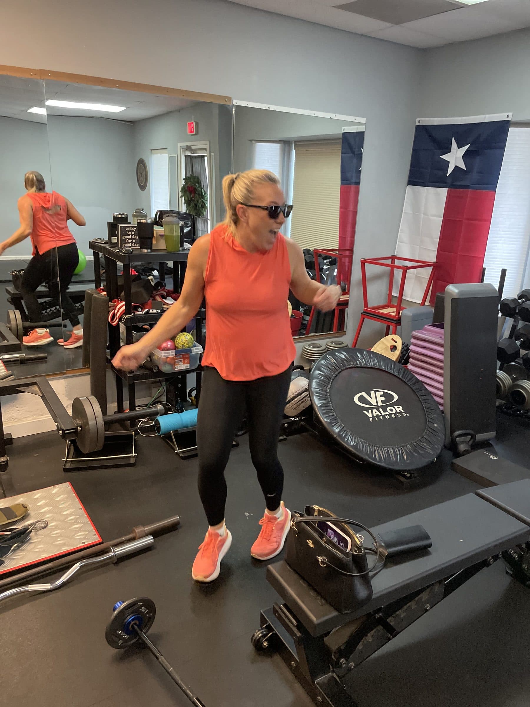PowerHouseATX client warming up inside the private gym